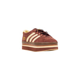 Adidas women’s sneakers brown suede platform design with cream stripes and thick sole